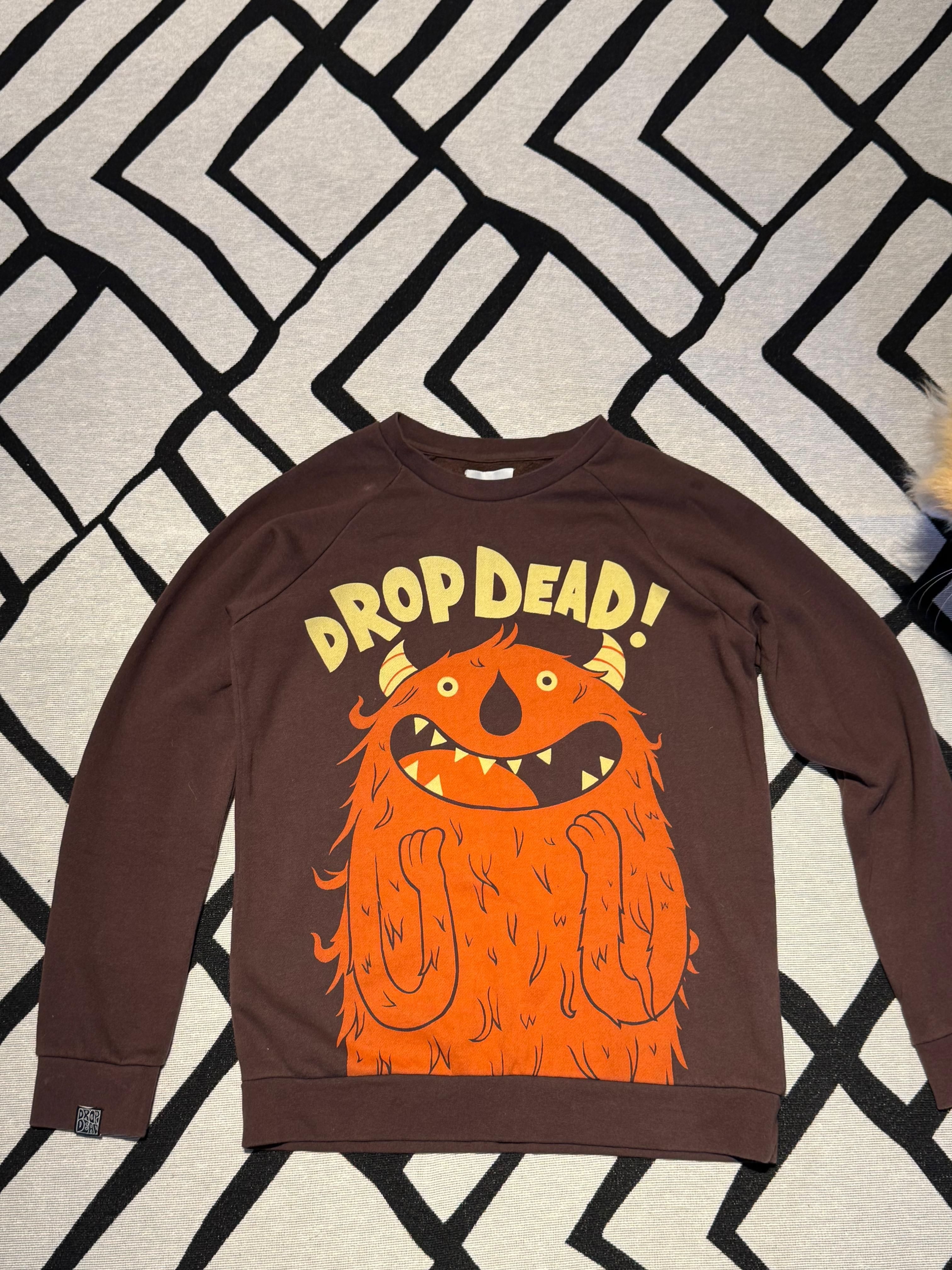 frente de Moletom Drop Dead monstro laranja