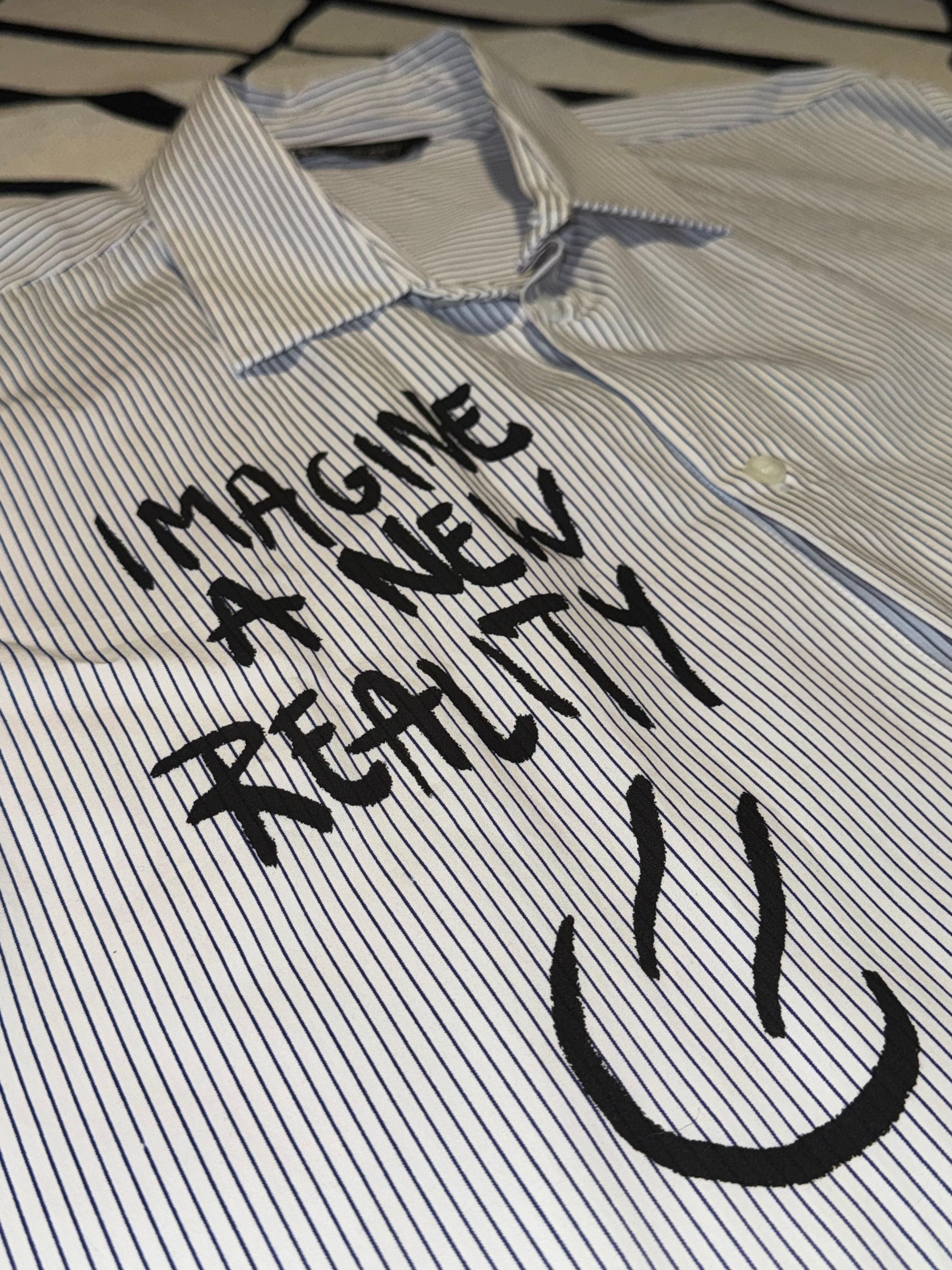 detalhe de Camisa Zara Imagine a New Reality